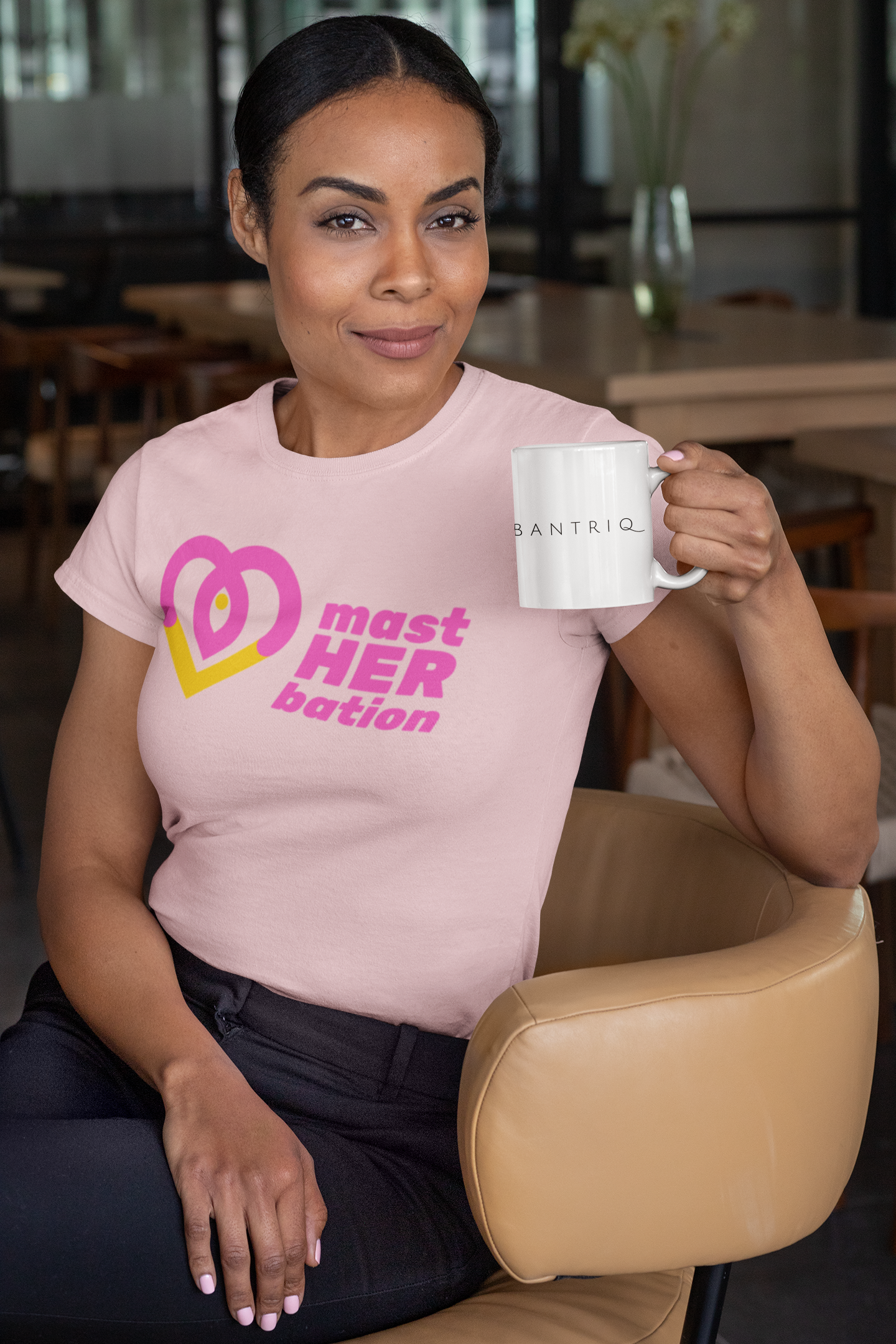 t-shirt-mockup-of-a-woman-sitting-on-a-chair-holding-an-11-oz-coffee-mug-31705